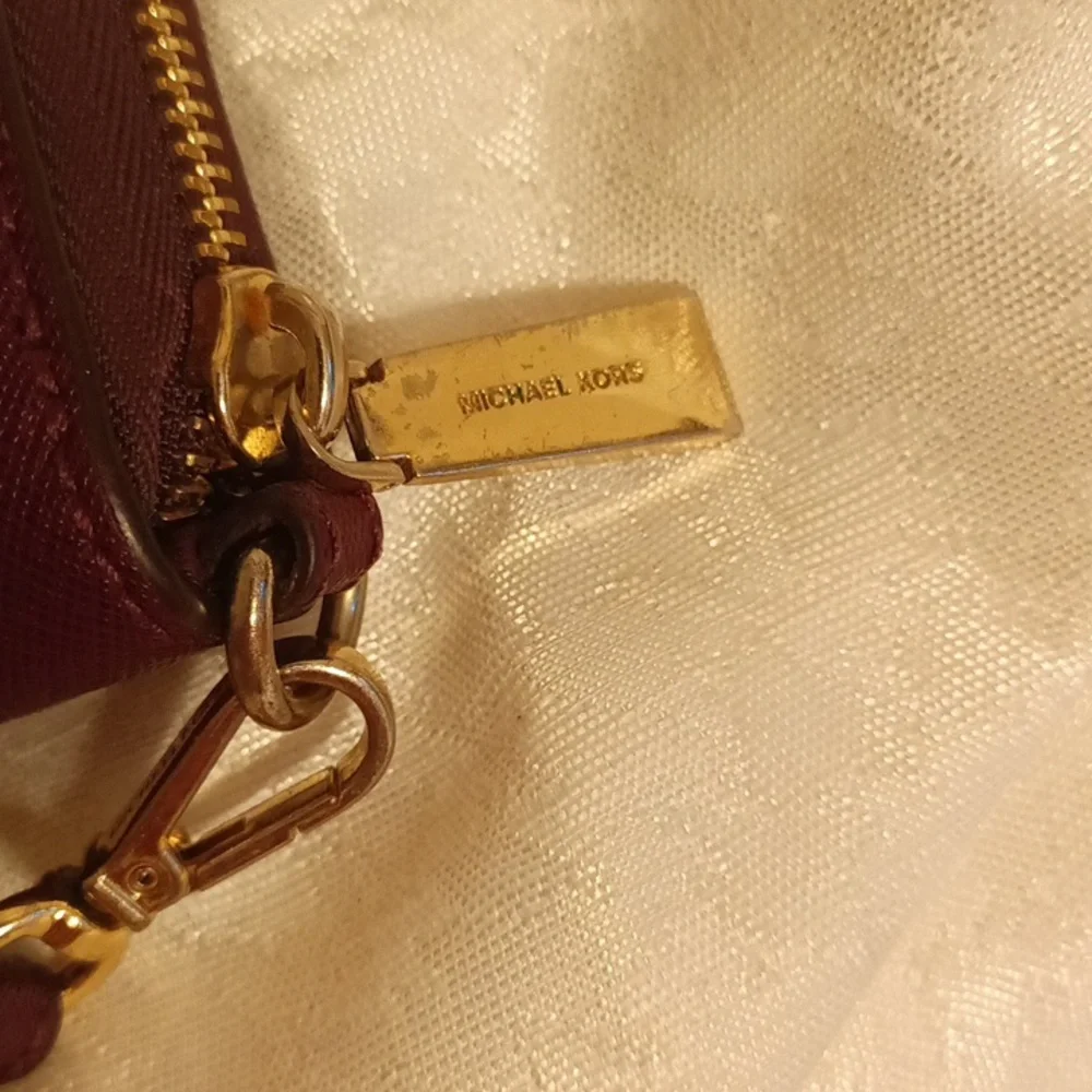 Michael Kors large Saffiano burgundy color leather accordion wallet/ wri…
